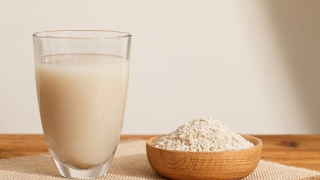 How does rice water prevent hair fall issues?