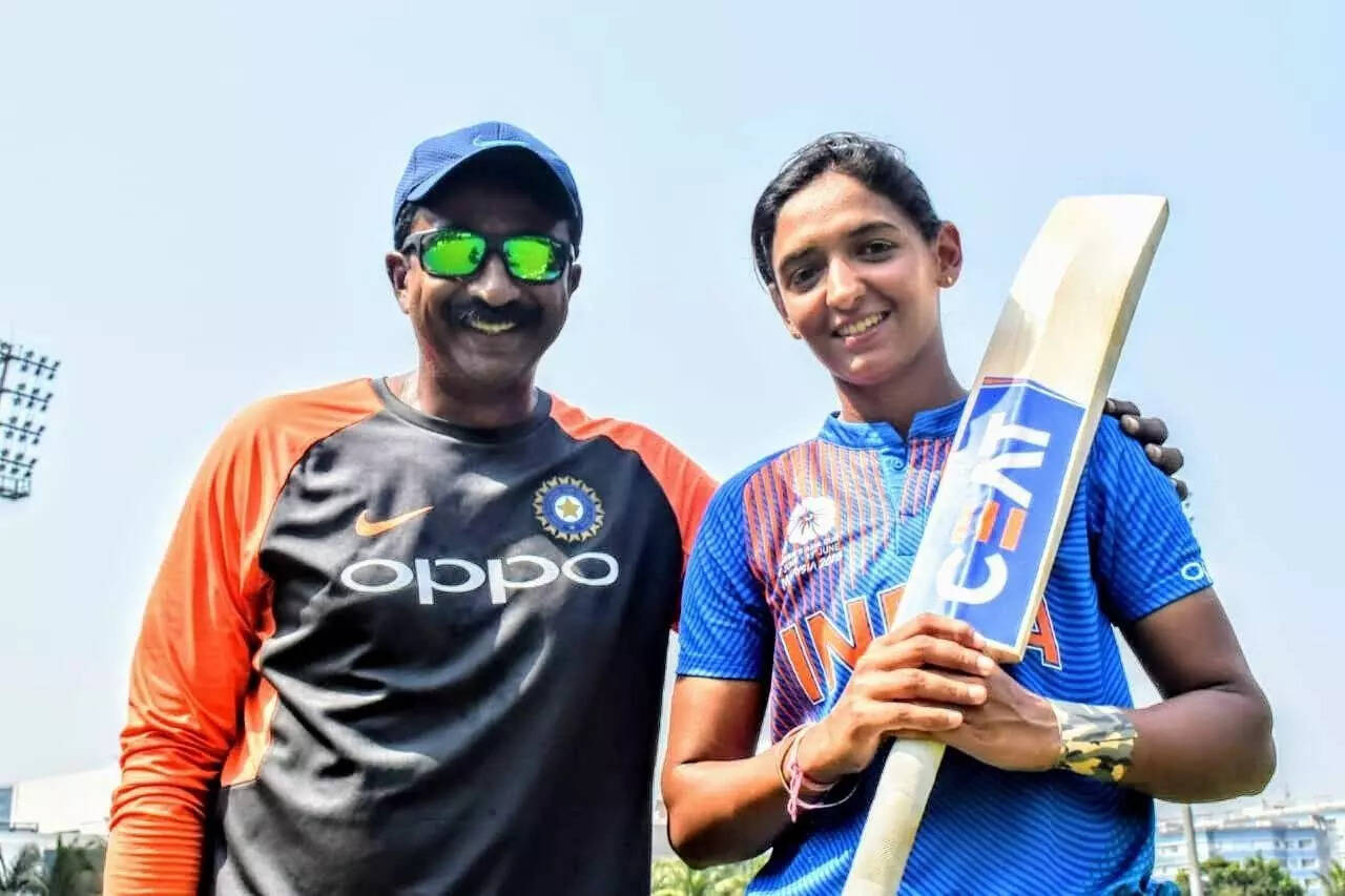 Biju George with current Team India skipper Harmanpreet Kaur with harman