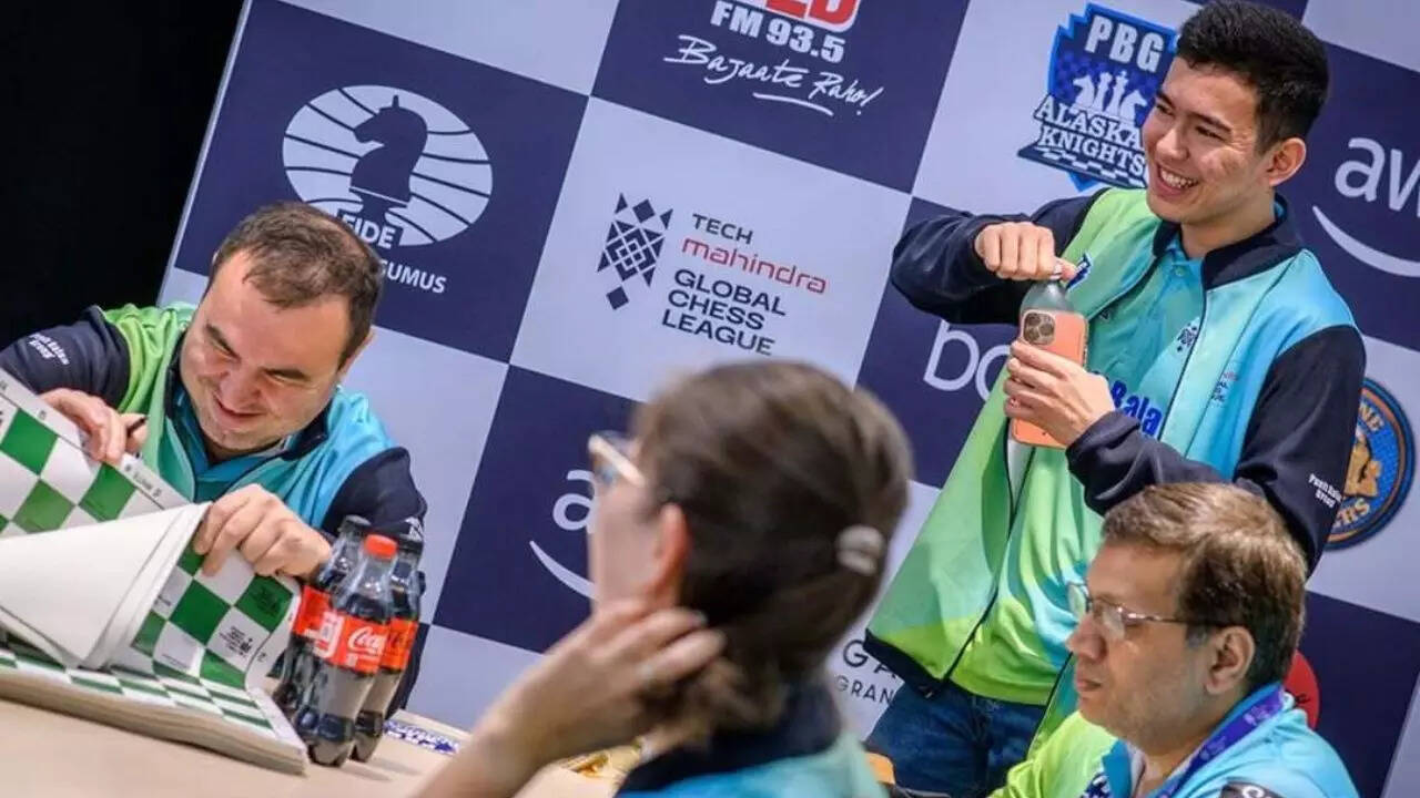 Nodirbek Abdusattorov standing on right (GCL Photo)