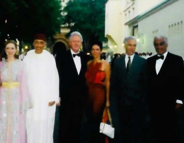 New York Post published this photo and claimed that this was taken at the wedding of Morocco king in 2002 where Bill Clinton took Epstein and Maxwell as his guests
