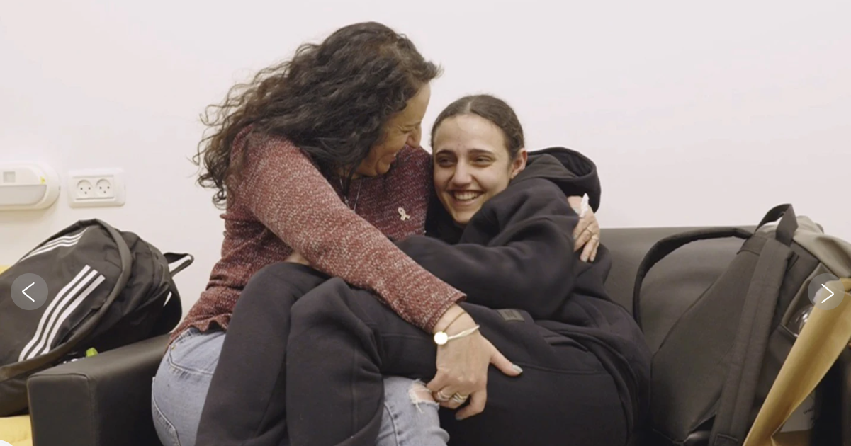 Released Israeli hostage Romi Gonen (right) with her mother