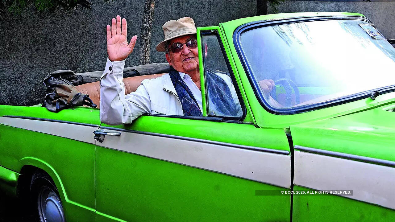 MA Khan and his Triumph Herald Convertible, a 1966 model