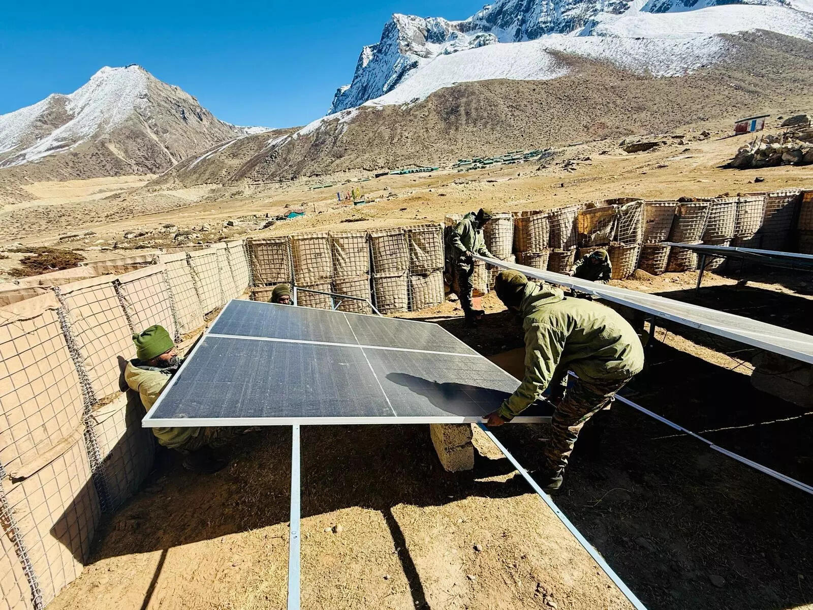 Army jawans installing a 10KW power plant at Muguthang village in North Sikkim. Credit: Trishakticorps_IA