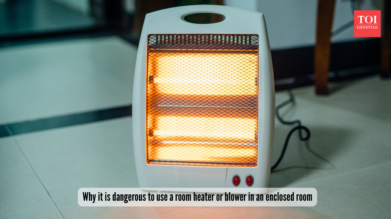 Why it is dangerous to use a room heater or blower in an enclosed room