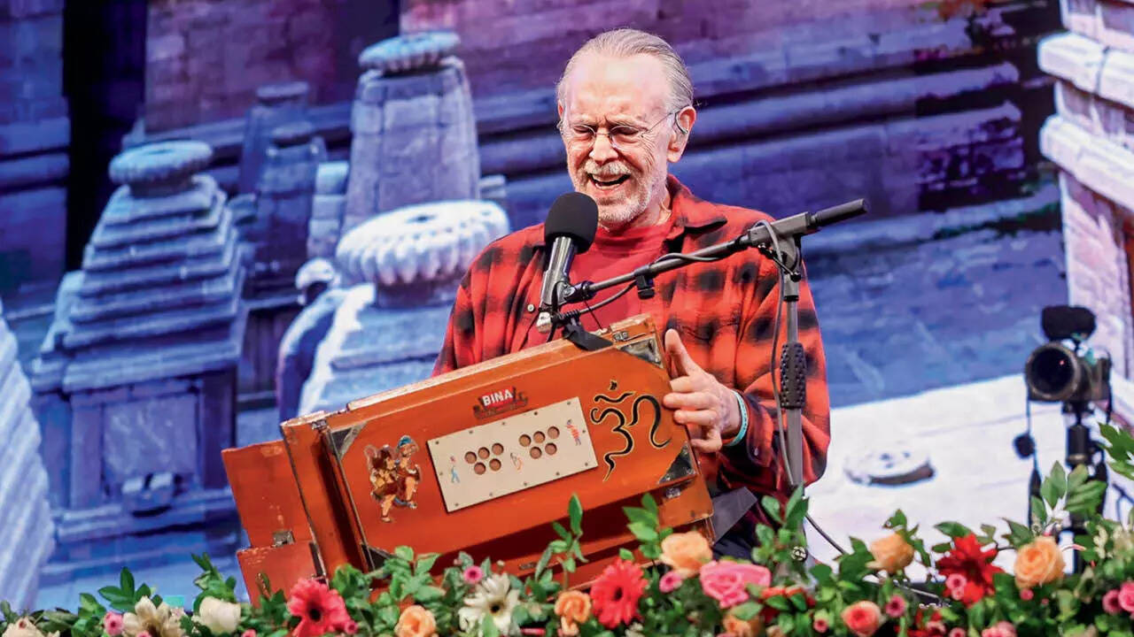 Krishna Das layers traditional kirtan with modern instrumentation, shaping a style rooted in gospel, blues, country and rock rather than raga
