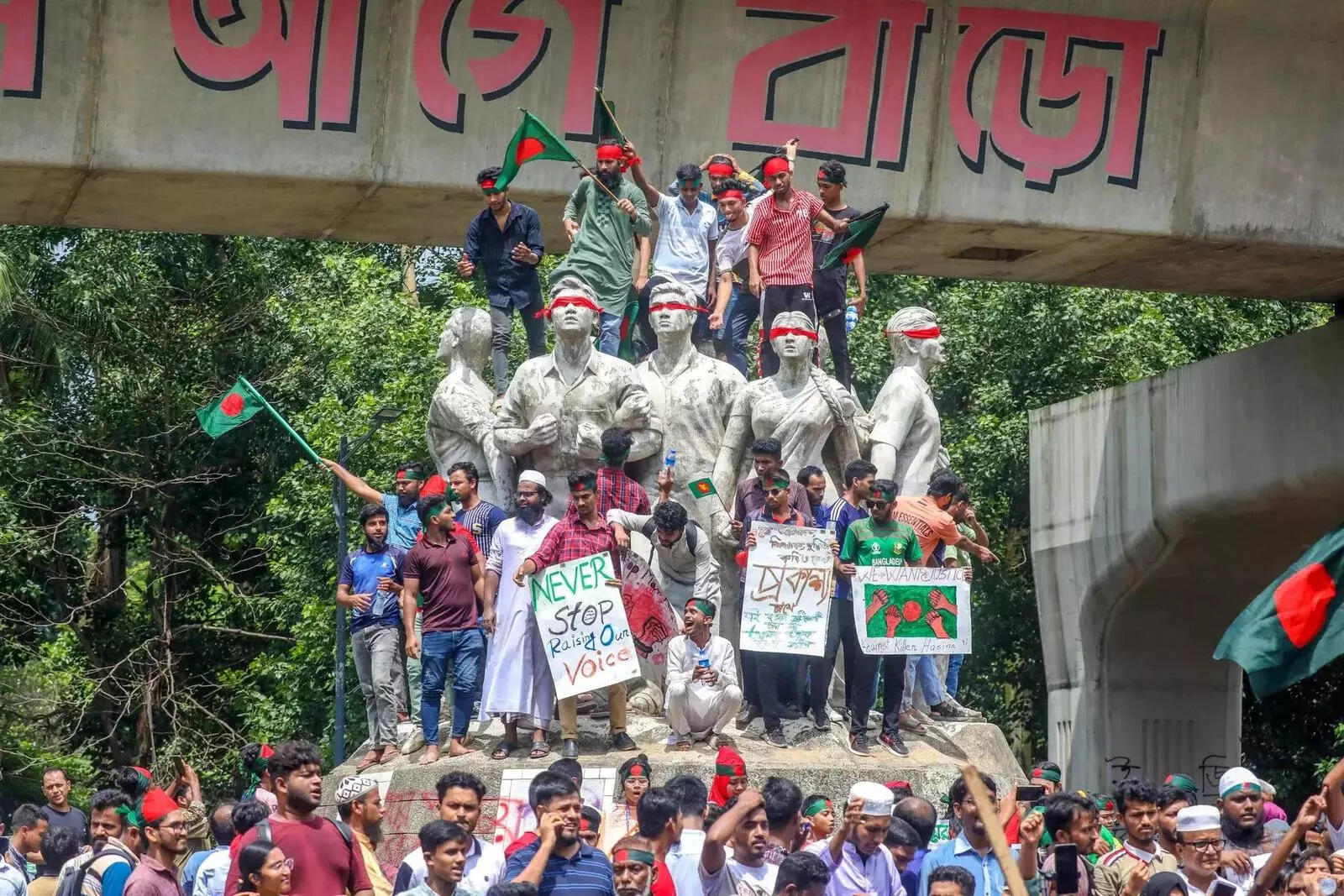 Dhaka_ Students shout slogan as they take part in a demonstration during the fir....