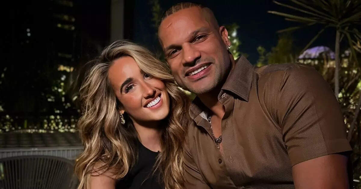 Sophie Shine and Shikhar Dhawan