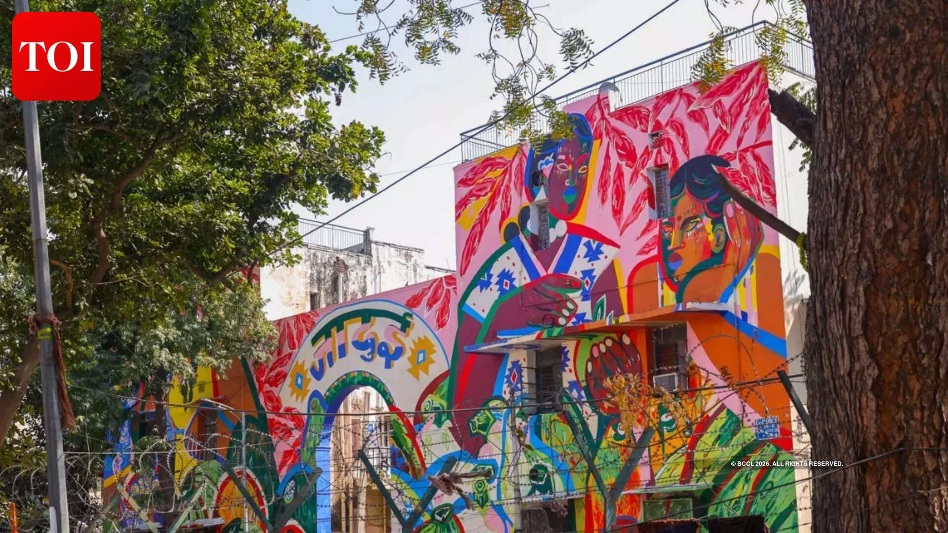 Jumu's Indian-Andean inspired mural portrays a marketplace in bright colours
