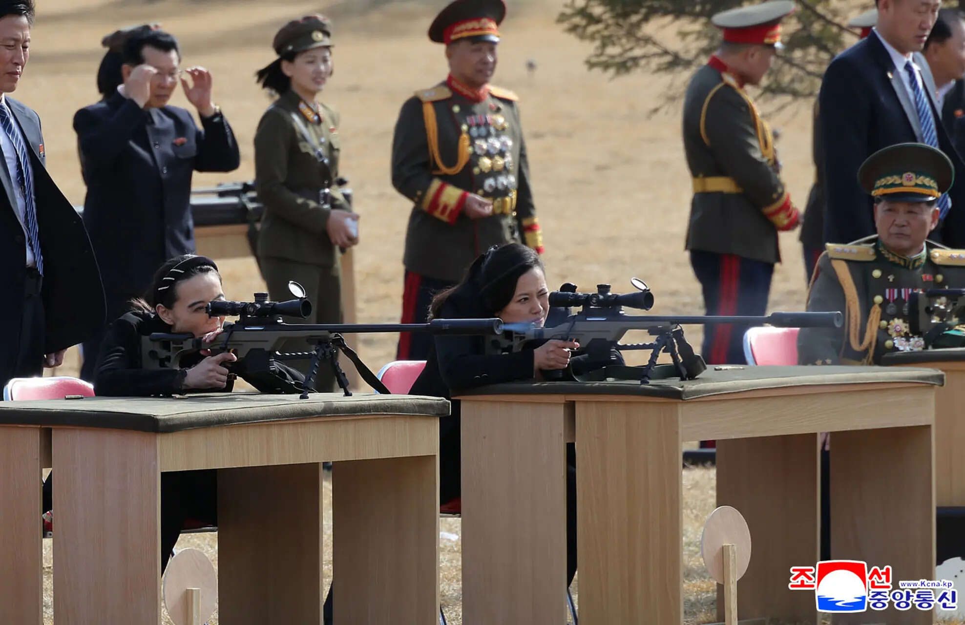 In this photo provided by the North Korean government, Kim Yo Jong, left, sister of its leader Kim Jong Un, and other senior officials test-fire new sniper rifles at a shooting range in an undisclosed location, North Korea, Friday, Feb. 27, 2026. (AP)