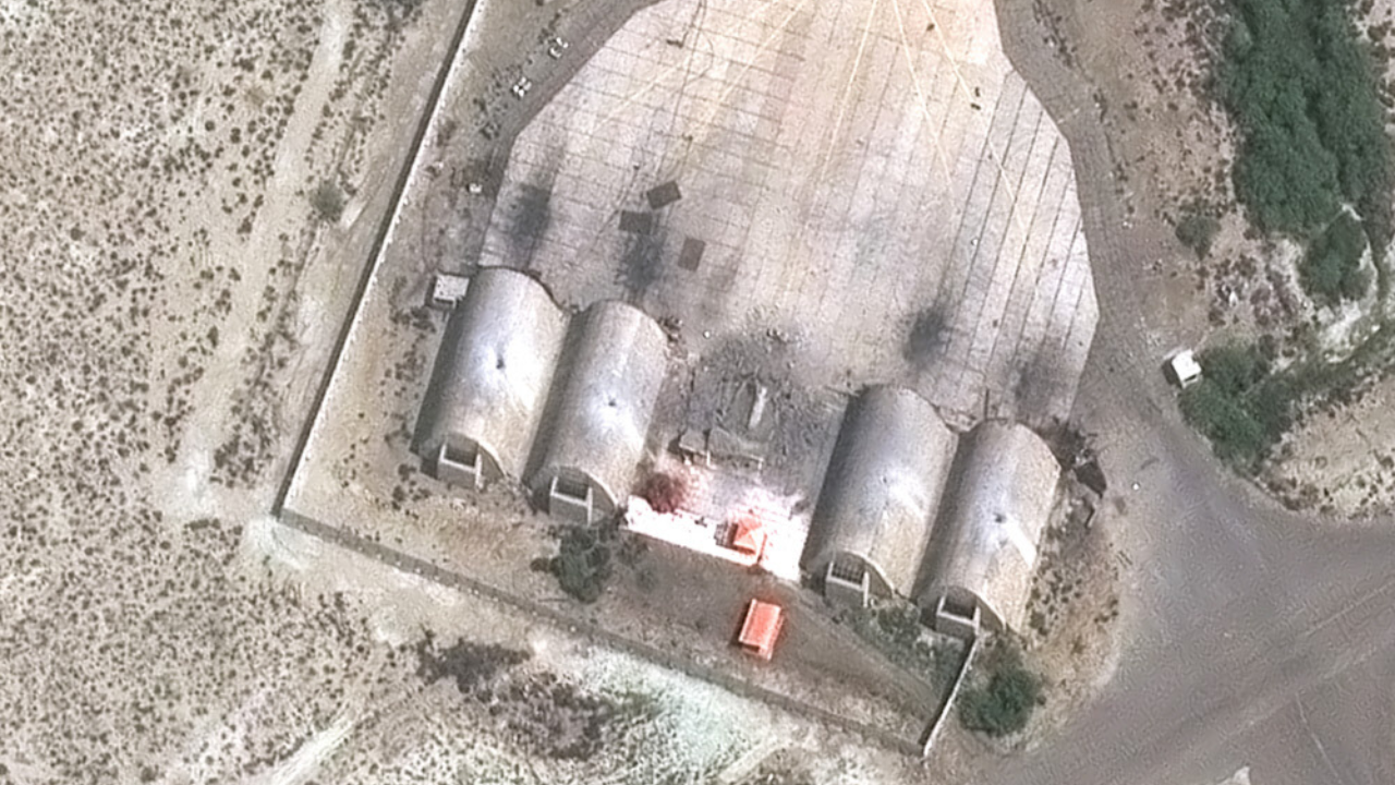 Damage from precision airstrikes on aircraft shelters is seen at the Konarak airbase. (AP photo)