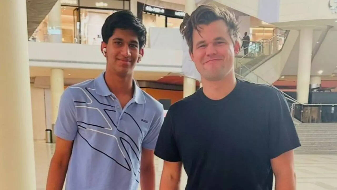 Aarav Dengla and World No. 1 GM Magnus Carlsen (Special Arrangements)