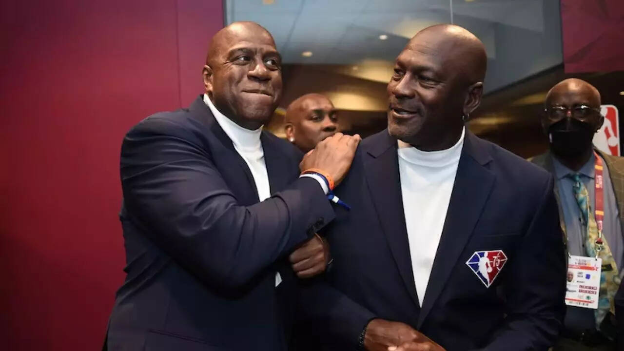 David Dow/NBAE via Getty Images Magic Johnson and Michael Jordan