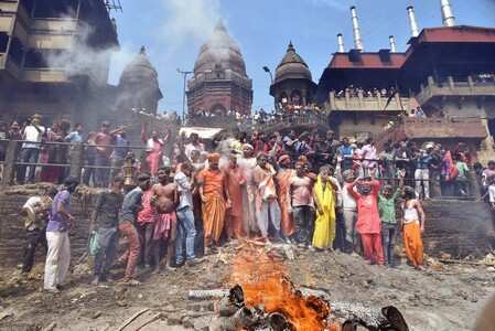 Varanasi: Lord Shiva devotees play Holi with Chita Bhasma (ashes) at the cremato...