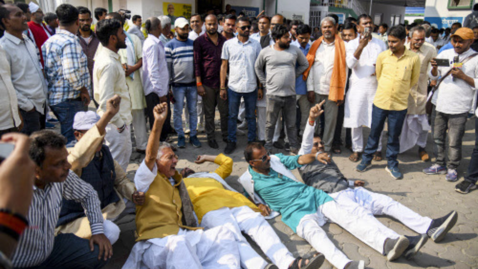 JD(U) workers and supporters staged protest after Nitish Kumar announced that he will be contesting the Rajya Sabha polls. (PTI photo)