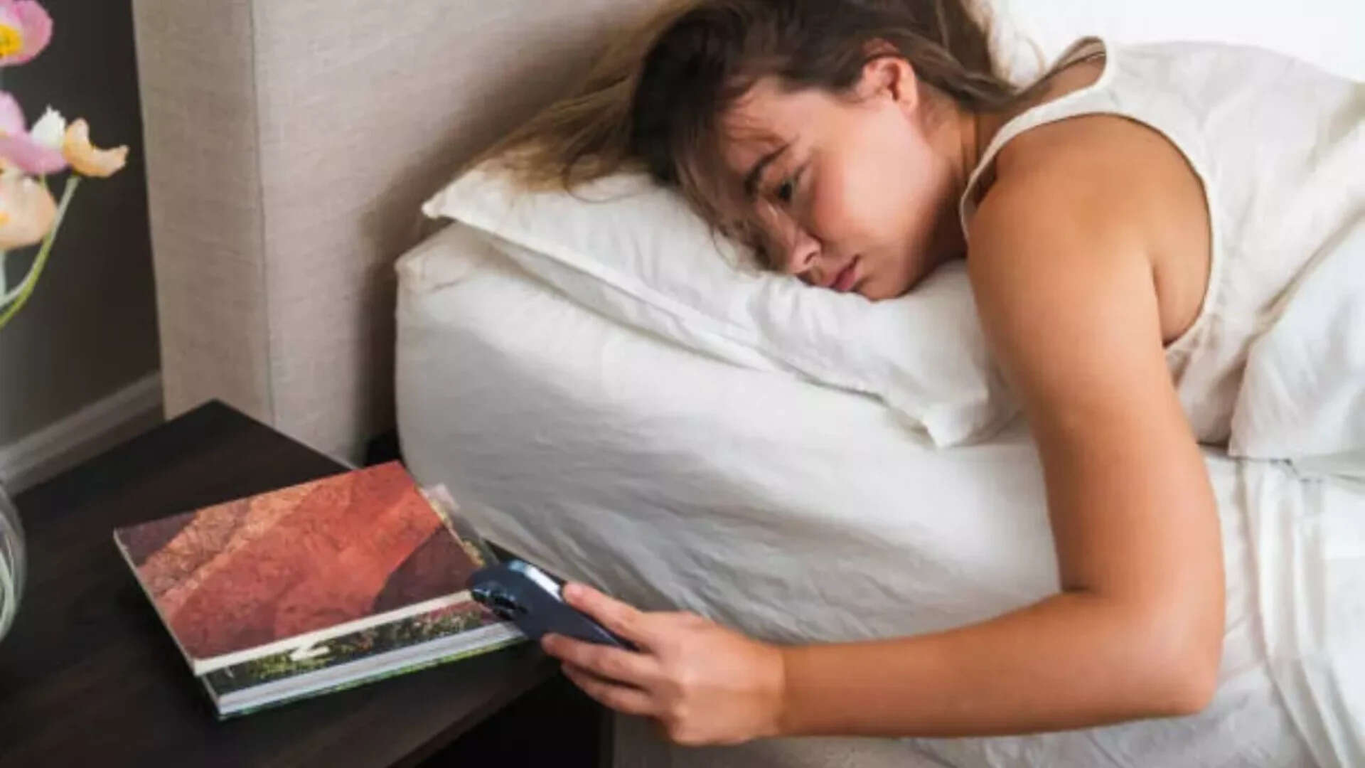 You have an alarm clock right by your bedside, your phone<br>