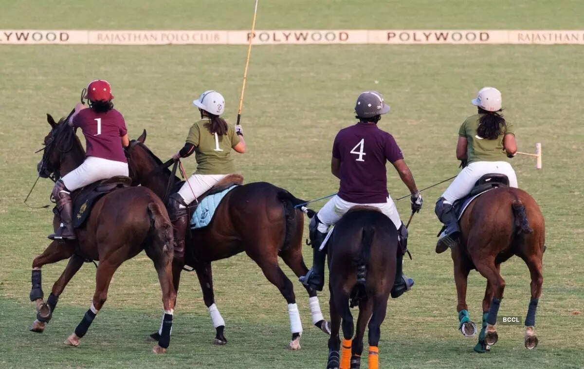 Team Pink and Team Green chasing the ball on the polo grounds