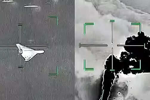 Debris hits a building on Sheikh Zayed Road as the UAE intercepts 10 ballistic missiles.