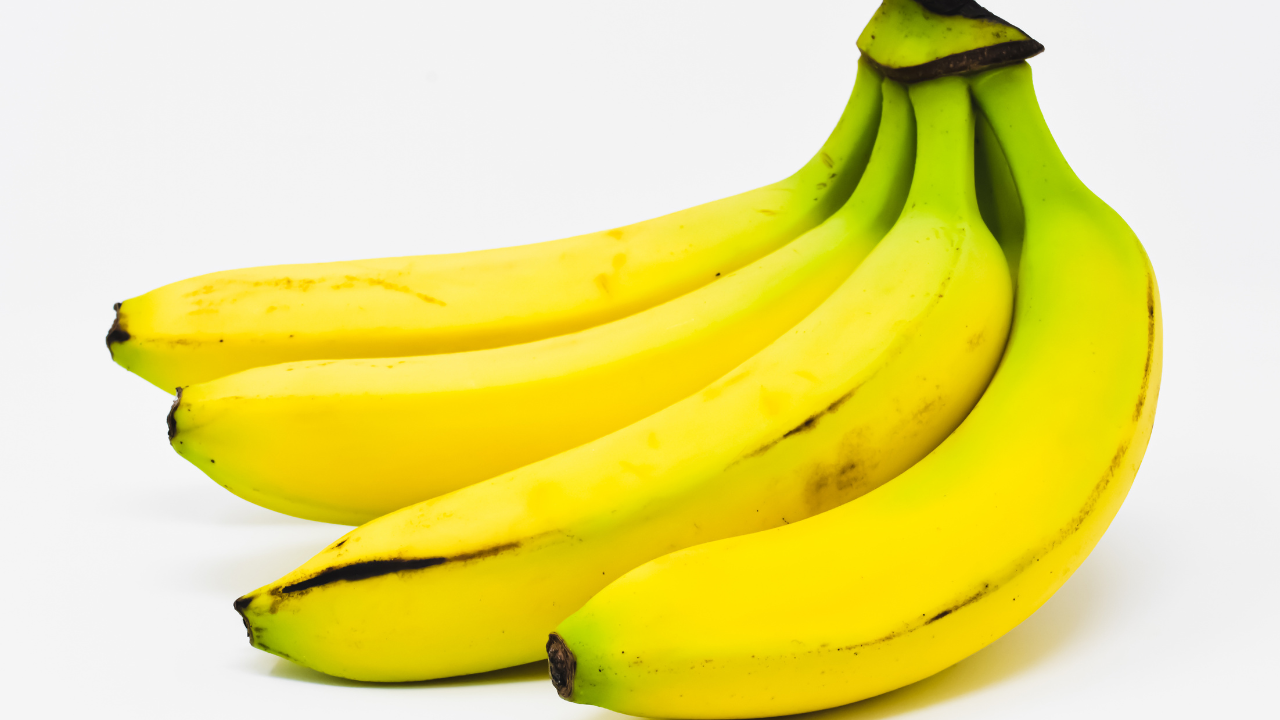 Image Credit: Canva bananas with slightly green tips