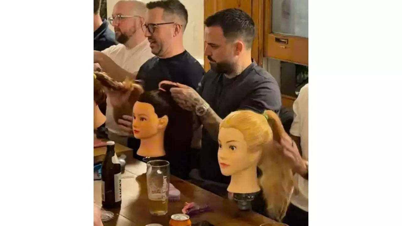  London dads gather in pub to learn how to braid their daughters’ hair