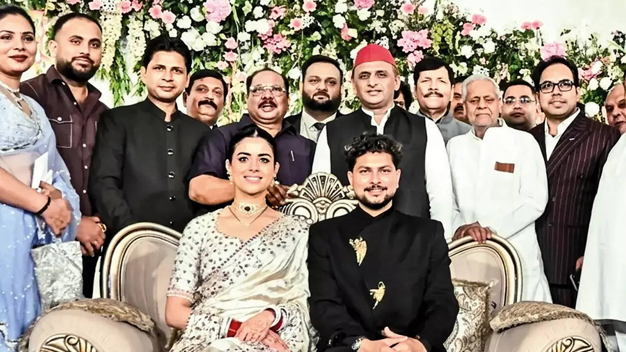 The newlyweds with Akhilesh Yadav