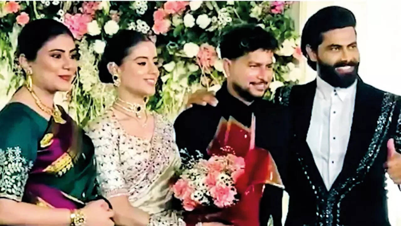 Ravindra and Rivaba Jadeja at the reception. A video of Kuldeep touching the couple’s feet at the reception went viral