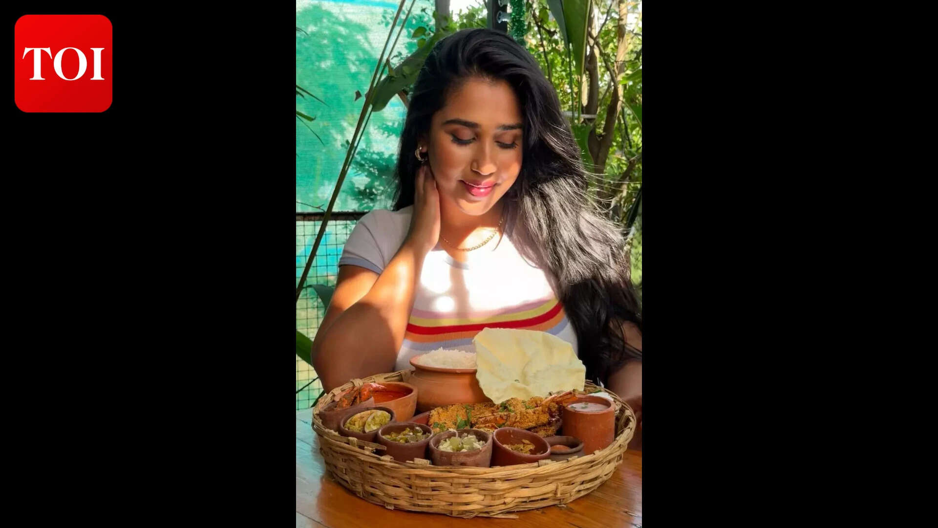 Scarlett Rose loves her fish thali