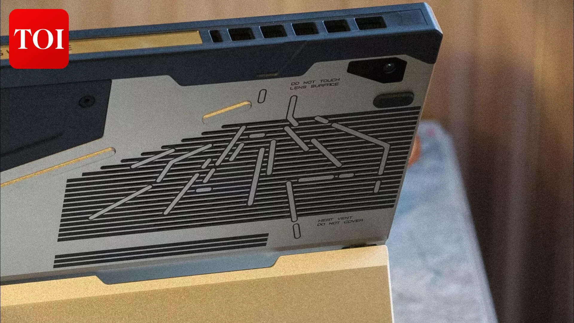 The laser-etched vent pattern up close. Field equipment or concept art—it's genuinely hard to tell