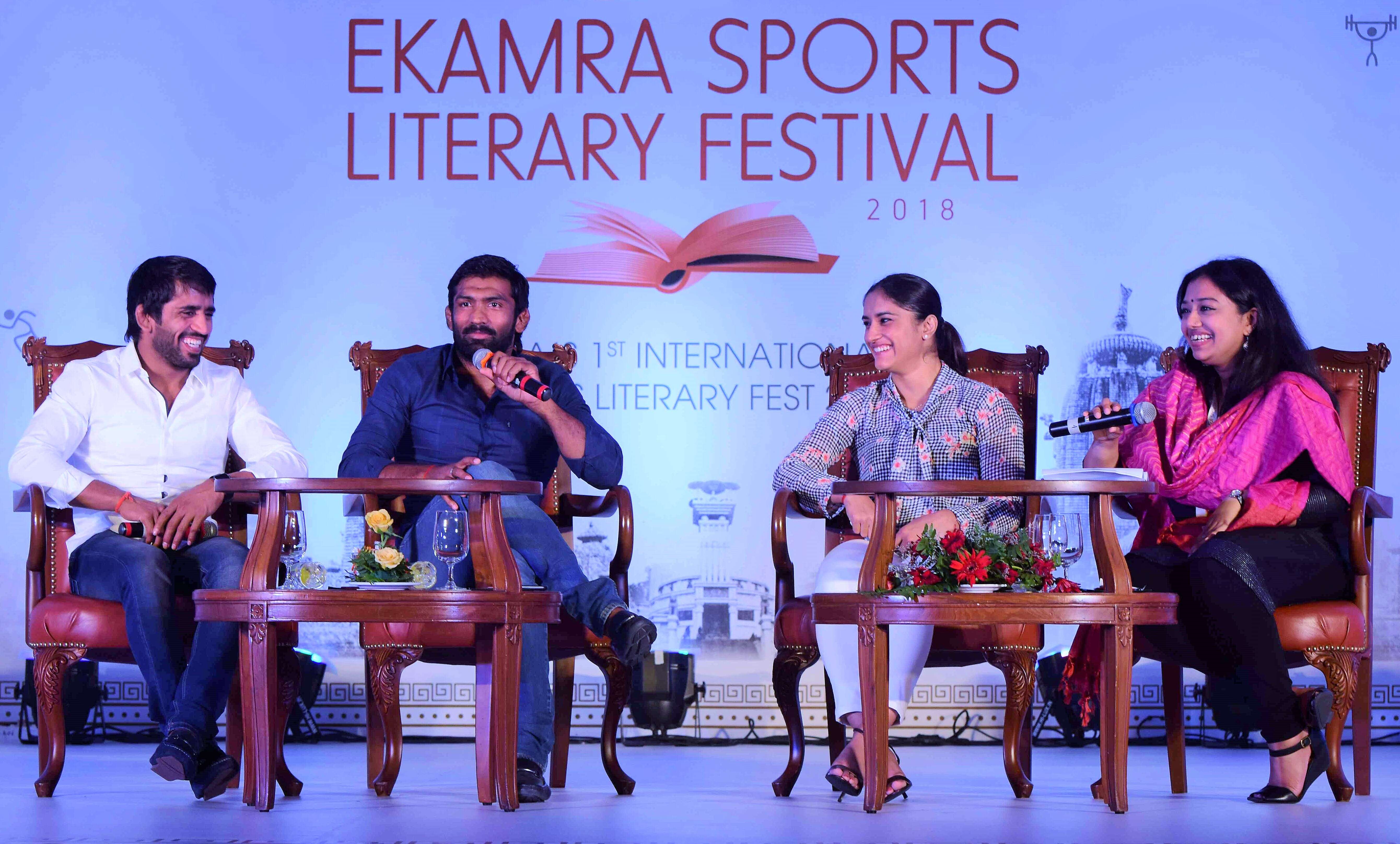 Bajrang Punia, Yogeswar Dutta, Vinesh Phogat talking to moderator Suprita Das