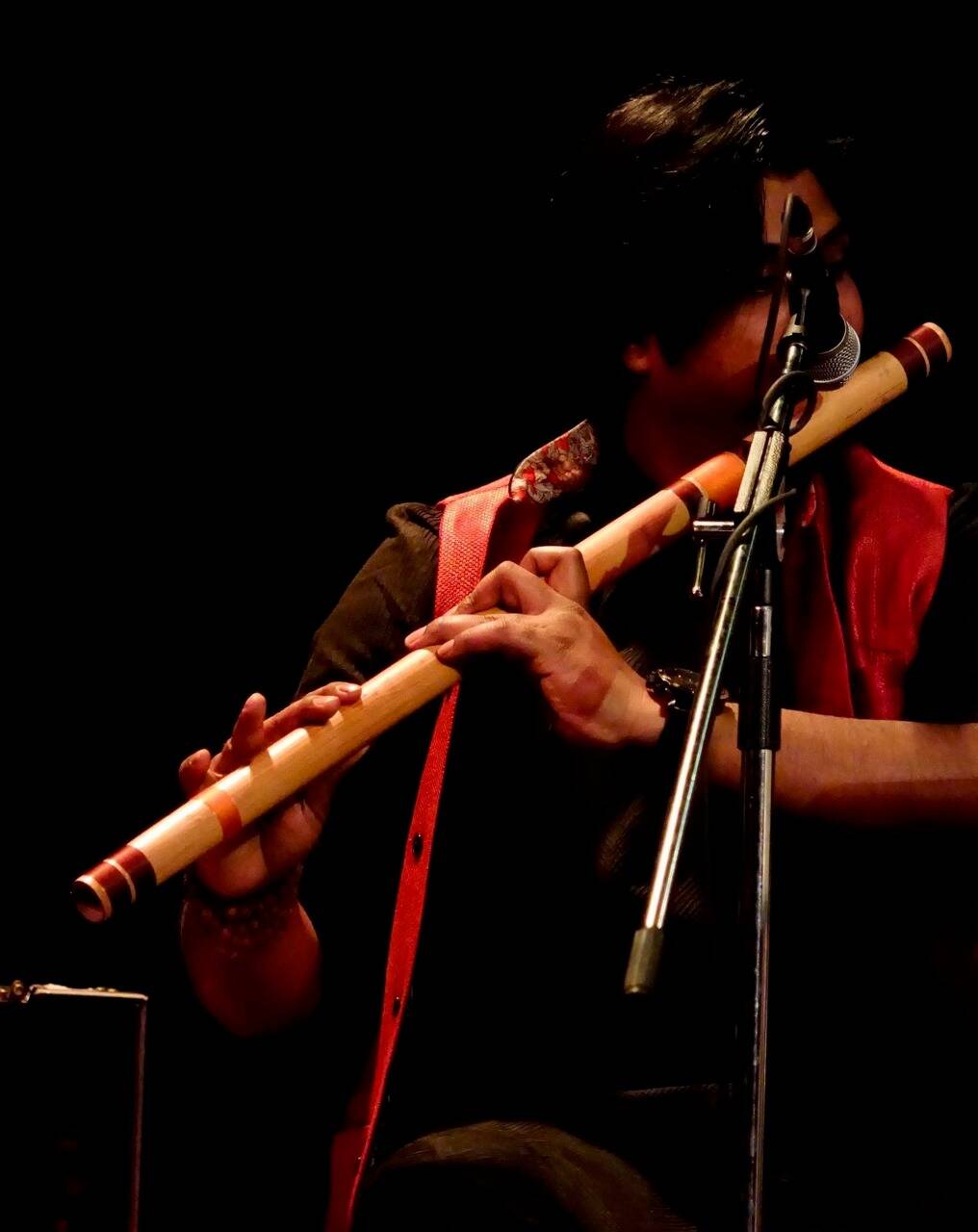 Paras Nath playing flute music