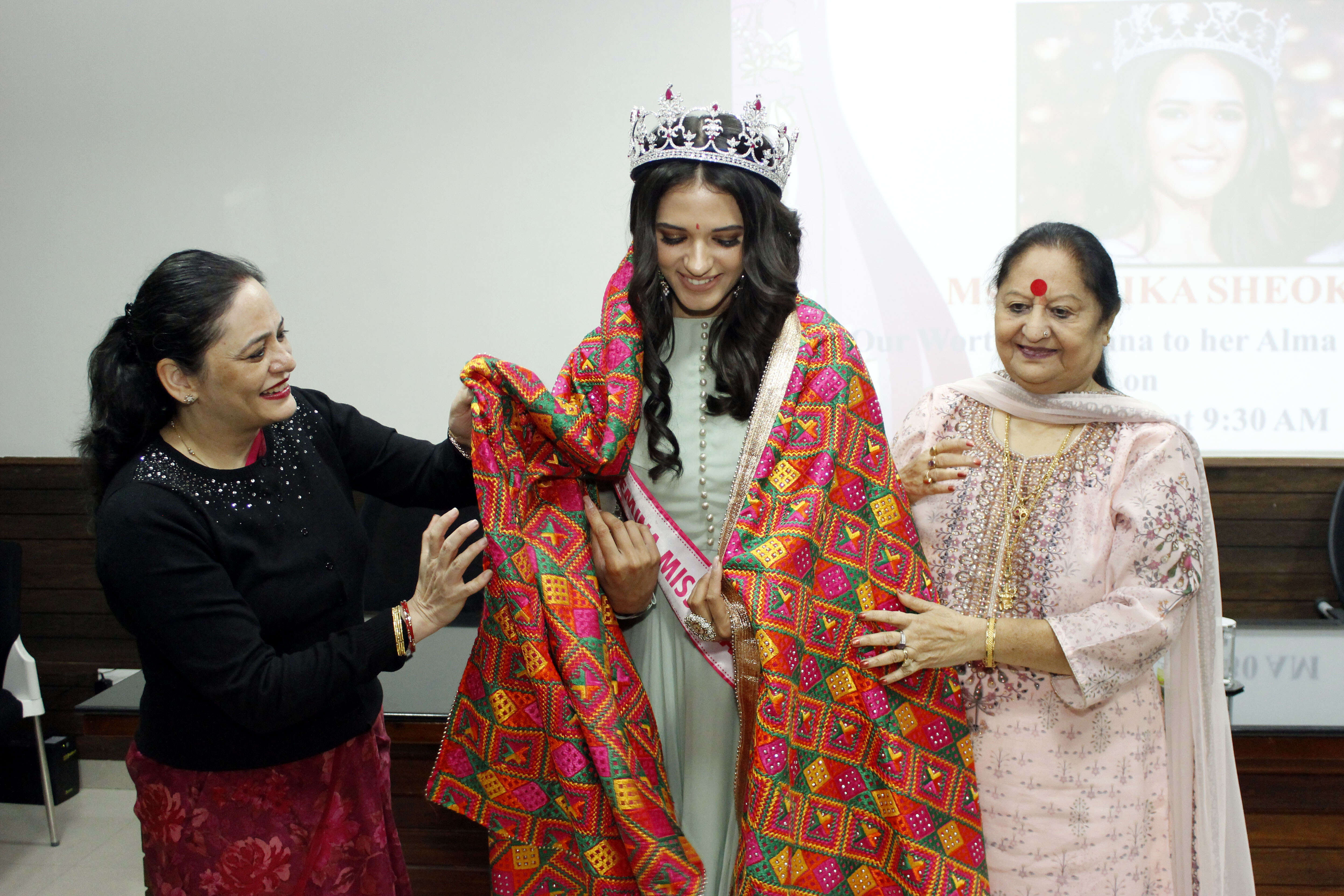 Manika being felicitated by Principal, Pooja Prakash and founder principal Madhu Behl