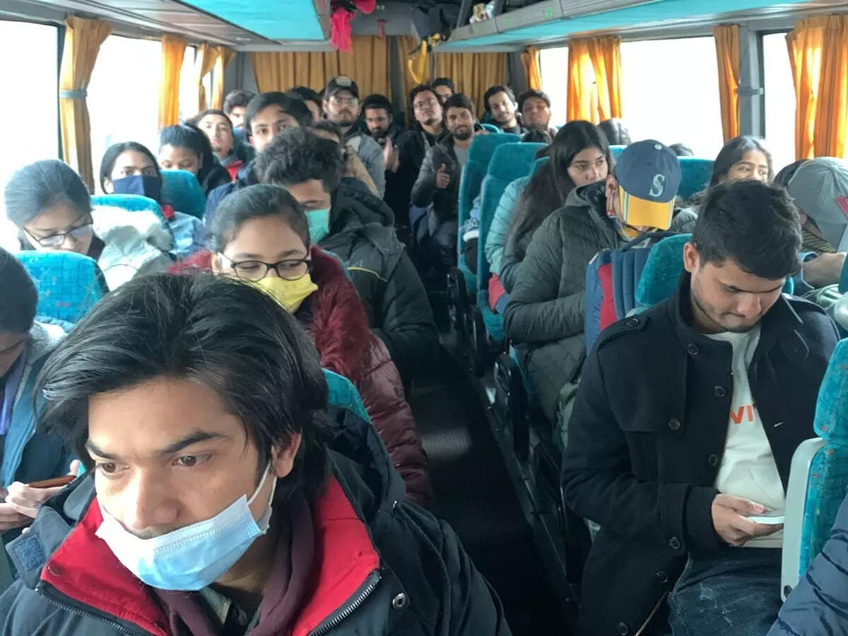 Students sitting inside the bus heading towards the Romanian border