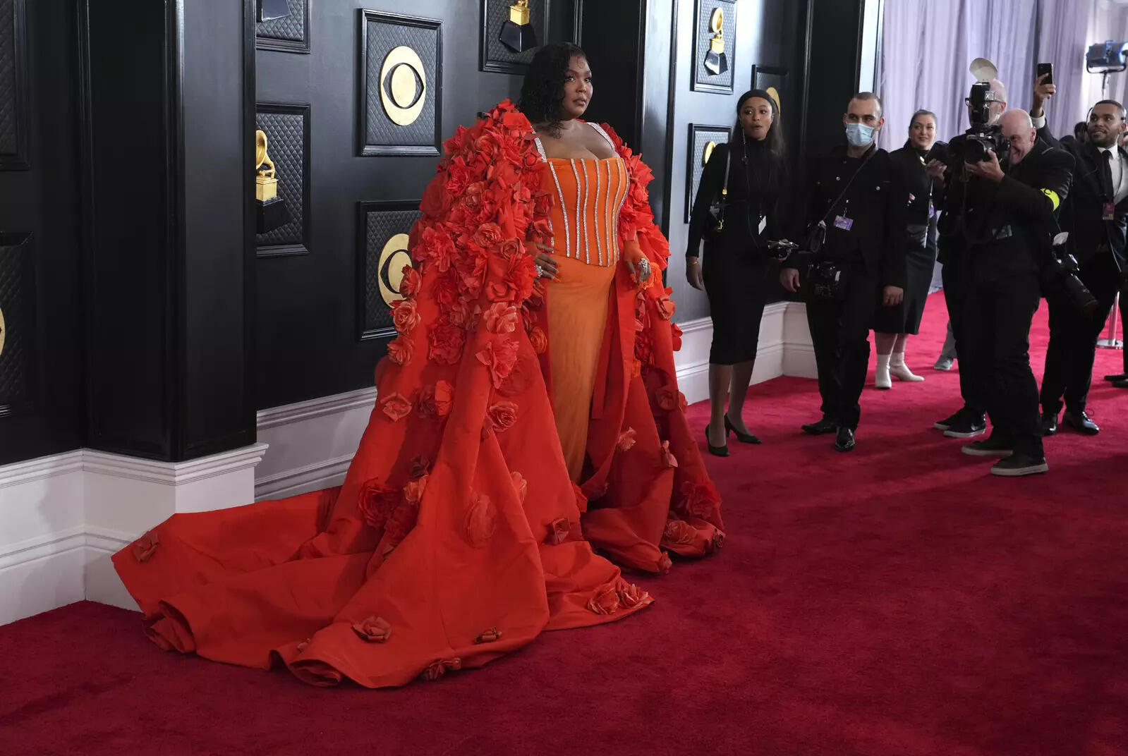 Lizzo wows in orange, Doja Cat dons black Latex at Grammys