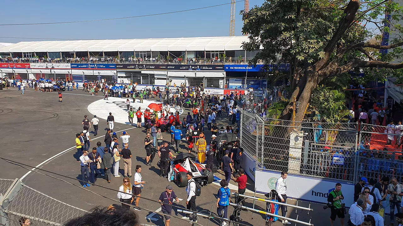 Formula E drivers lining up on the grid