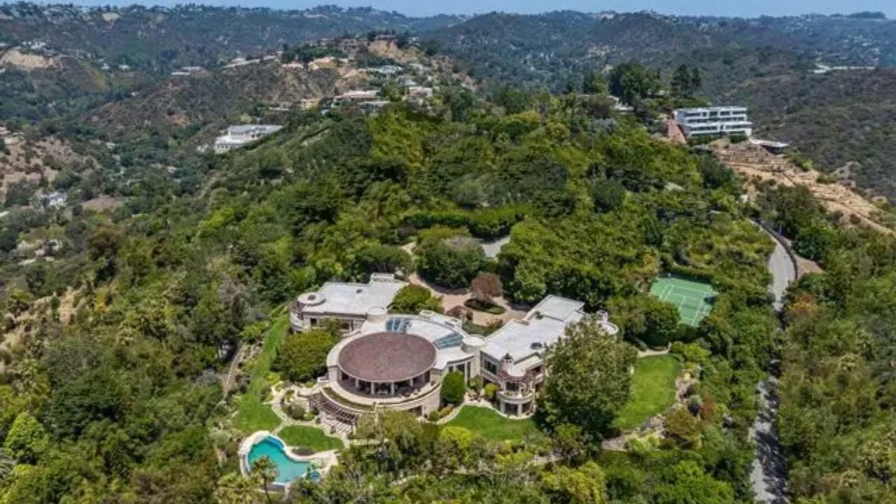 The property's design is centred on a dramatic circular structure topped by a dome, with wings extending from the central area<br>