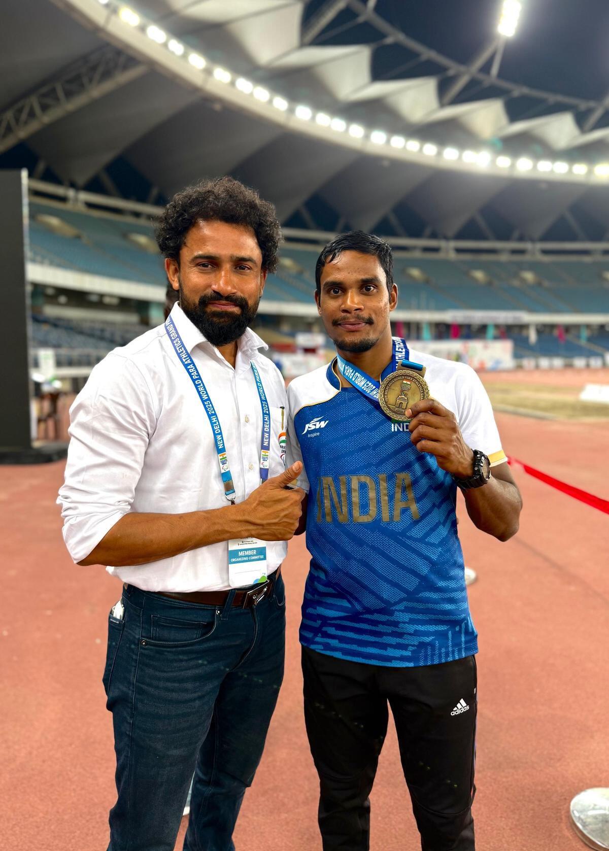Dilip with his coach Vaijnath Kale