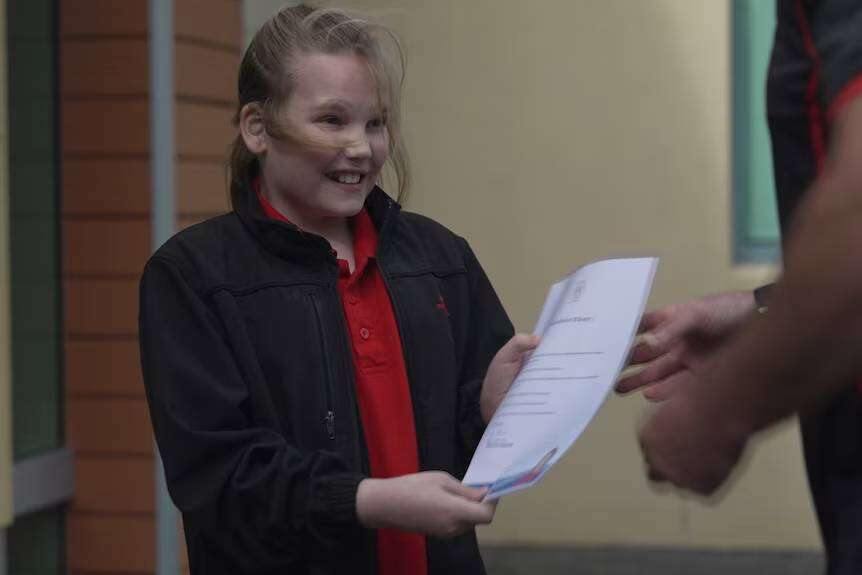 Ollie received a certificate of bravery for helping his family escape the house fire.