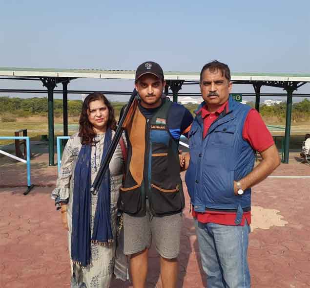 Shapath with his mom and dad.<br>