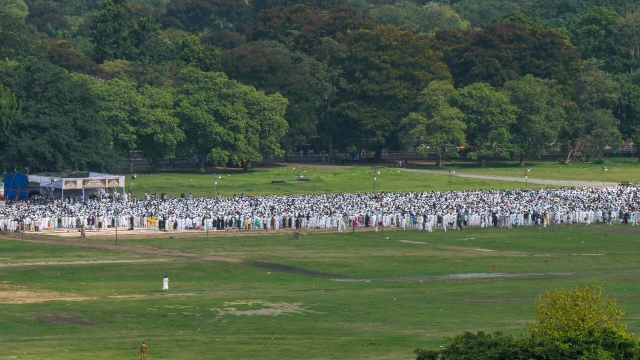 People gather to offer prayers on the occasion of Eid al-Adha at Brigade Parade Ground (Photo credit: PTI)
