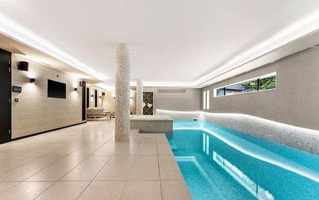 The luxury property includes its own swimming pool, gym and games room.