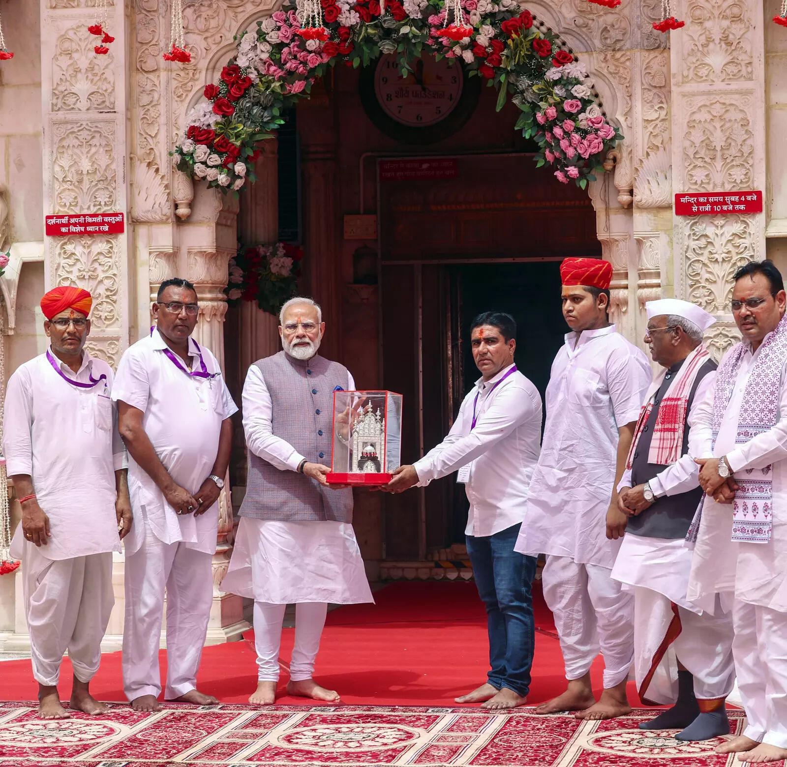 Prime Minister Narendra Modi being presented a memnto during his visit to Karni Mata Temple at Deshnoke in Bikaner
