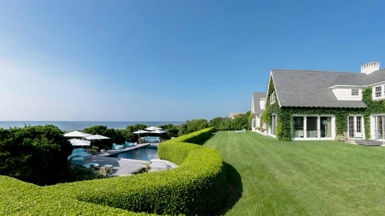 Hamptons Covert The pool and yard