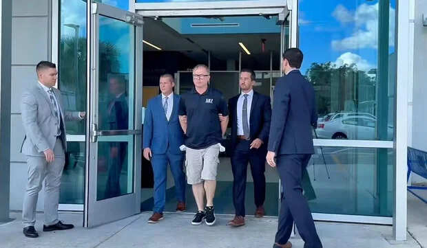 Dale Smith Jr being arrested 15 years after Michelle Parker's disappearance.