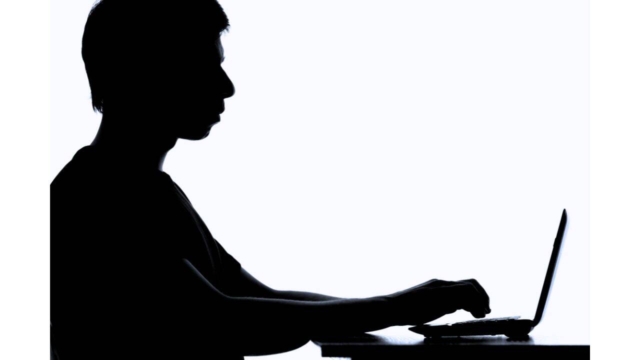 Sad man with laptop