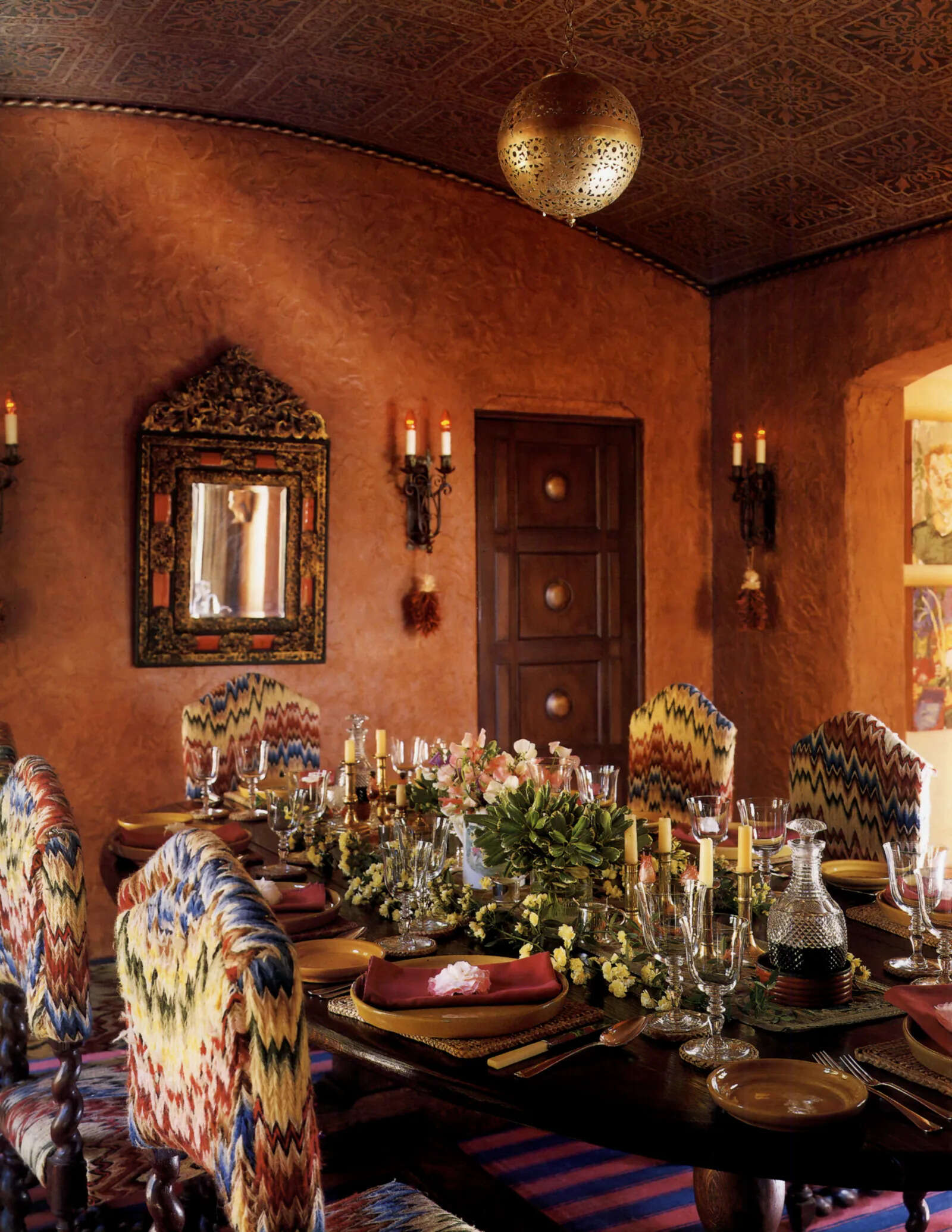 Tim Curry brought his personal style to his Los Feliz home, blending 18th-century Italian oak chairs, original architectural details and rich, warm colours.