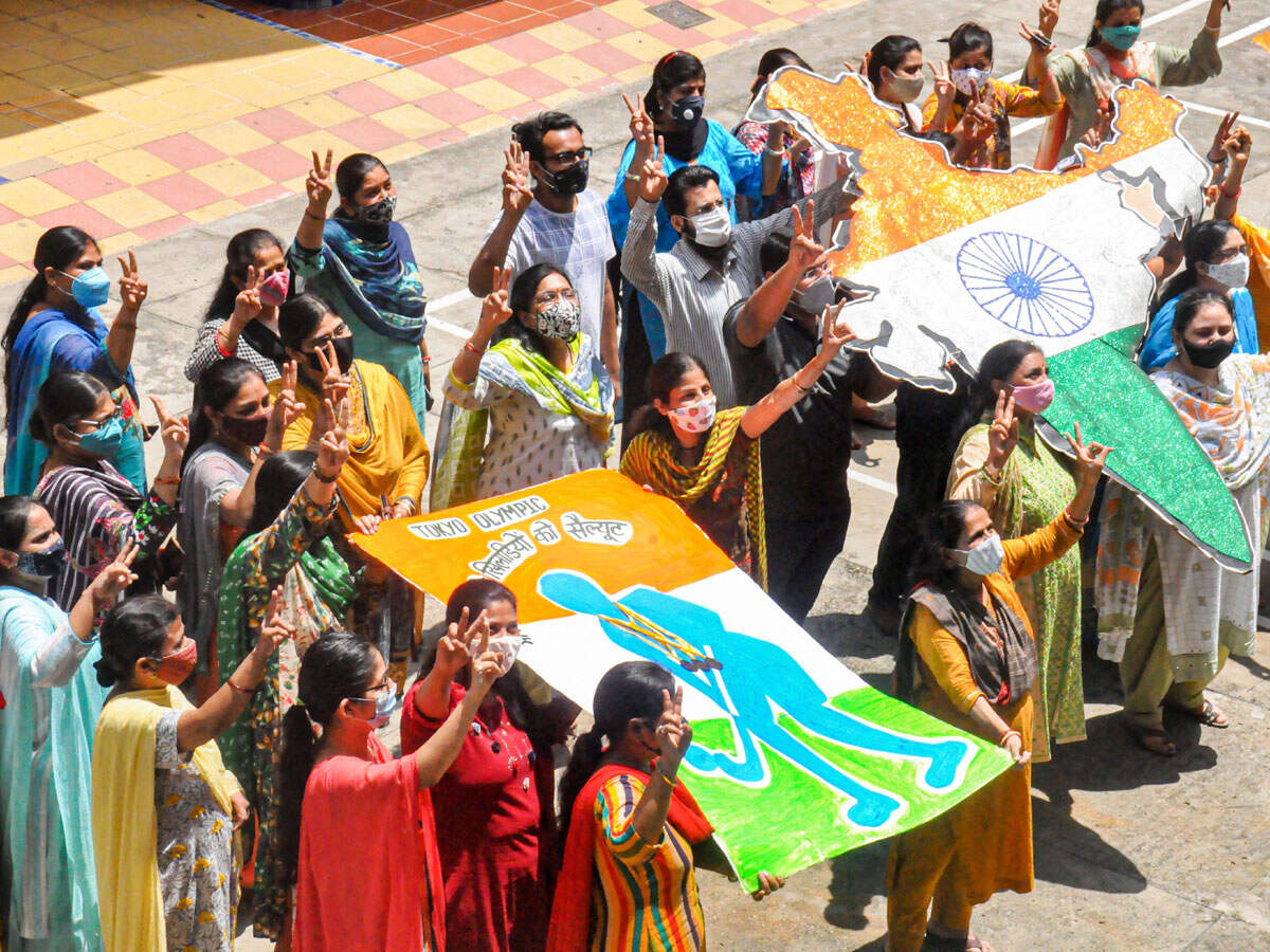 Teachers of a school in Moradabad, celebrate after Indian men's hockey team won bronze medal at the Tokyo Olympics. PIC Credit: PTI