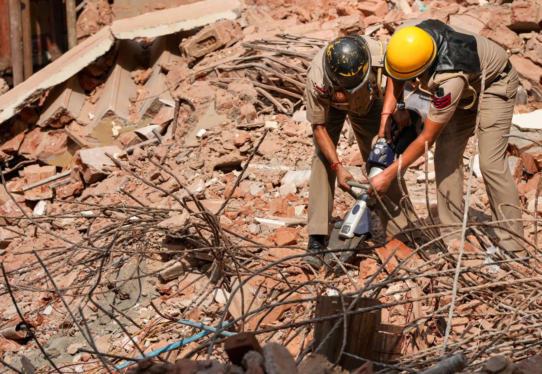 Rescue ops at Satya Niketan building collapse site in Delhi