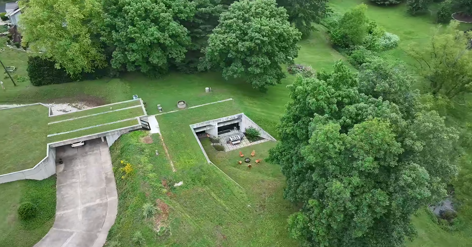 The north-facing home uses the earth itself as part of its environmental strategy, reducing the impact of extreme outdoor temperatures.