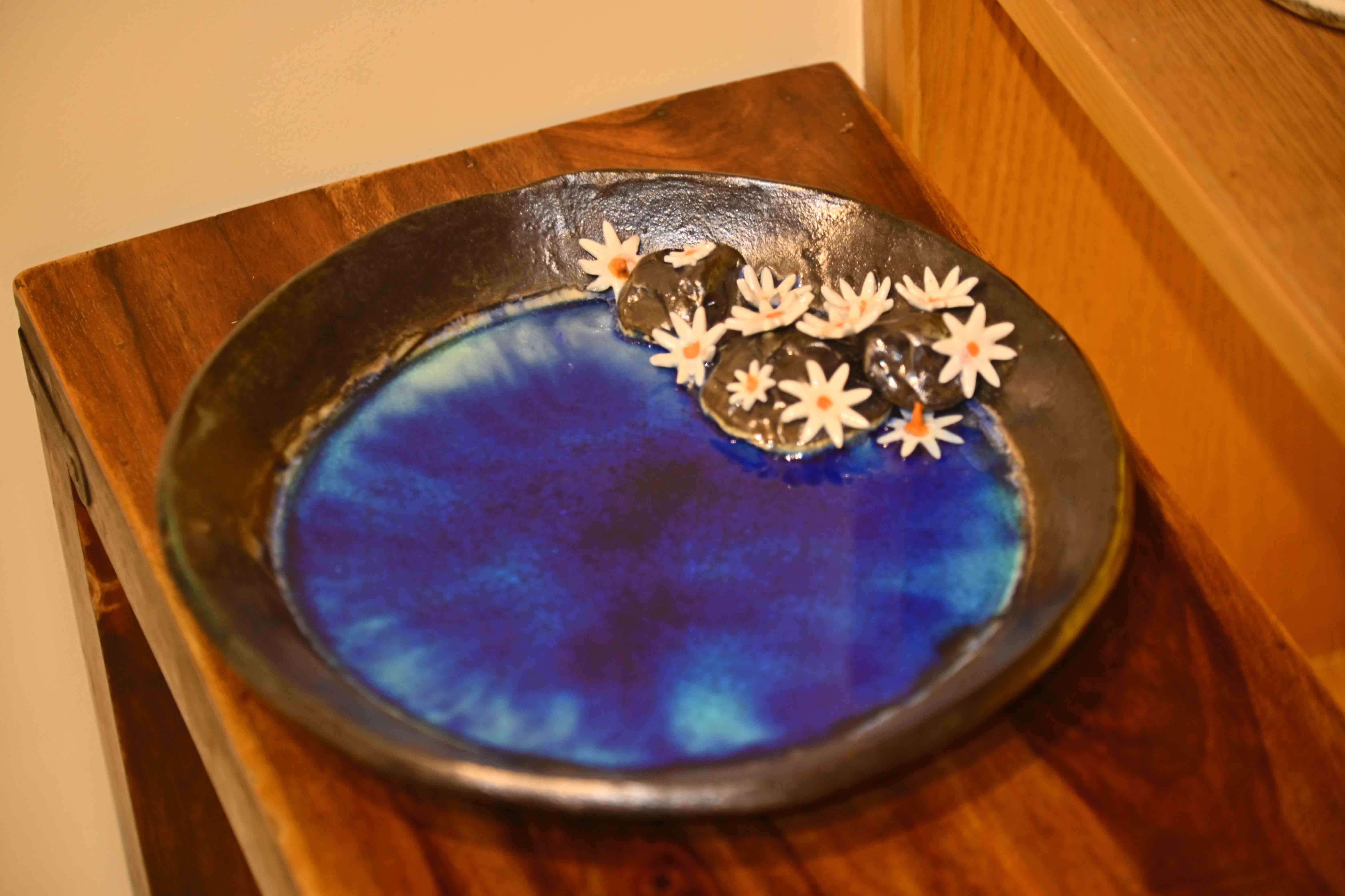 A platter with night-flowering jasmine to add beauty to your centre table all-year round<br>