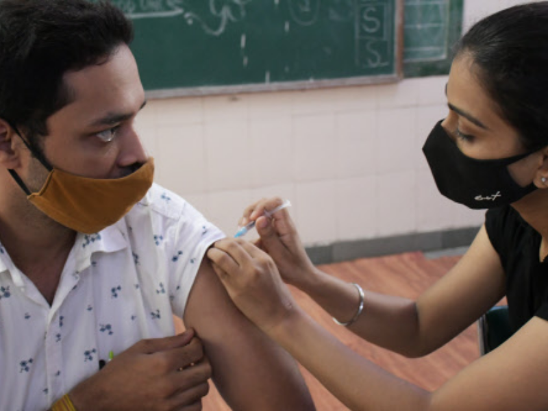 A beneficiary receiving a Covid shot in Delhi — Tarun Rawat (TOI)