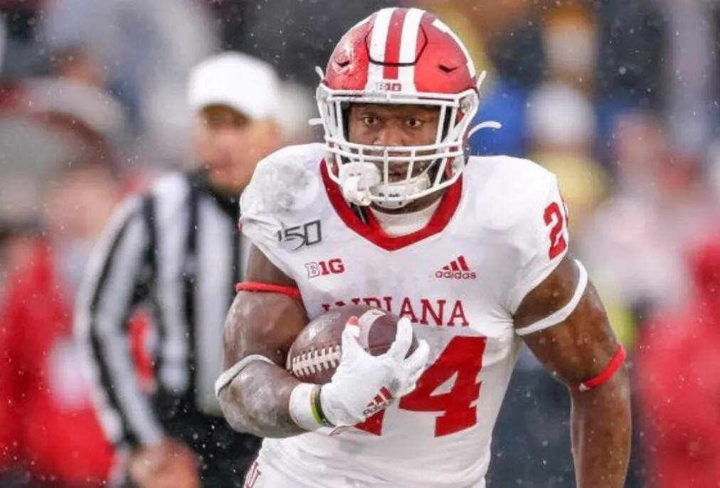 A chance encounter over an Indiana backpack raised $17,000 and helped a homeless former football star find a home
